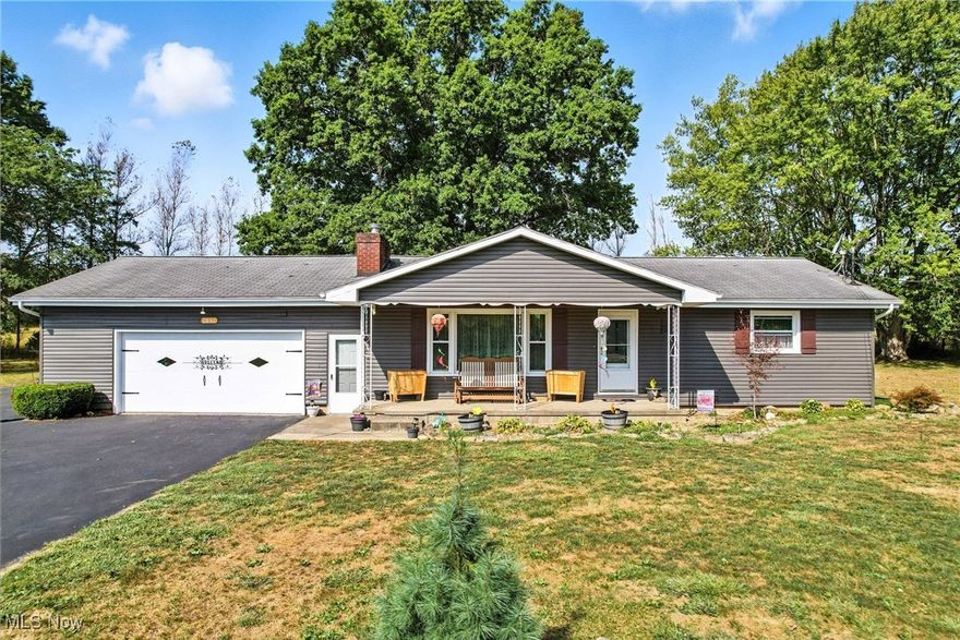 Welcome to your new home in the highly sought-after Columbiana school district! This charming 2-bedroom, 2-bathroom ranch sits on just under an acre of land, offering a perfect blend of space and comfort.

Step inside and be greeted by a bright and airy living room, highlighted by a large bay window that floods the space with natural light. A stunning stone fireplace creates a cozy focal point, perfect for relaxing evenings. The home features new siding and an updated bathroom, ensuring a fresh and modern feel.

The full basement, with endless potential, is ready for your personal touch—imagine a home gym, media room, or extra living space! The oversized driveway provides ample parking for multiple vehicles. Don't miss this opportunity to own a beautiful home with plenty of room to grow in a fantastic location. Schedule your showing today!