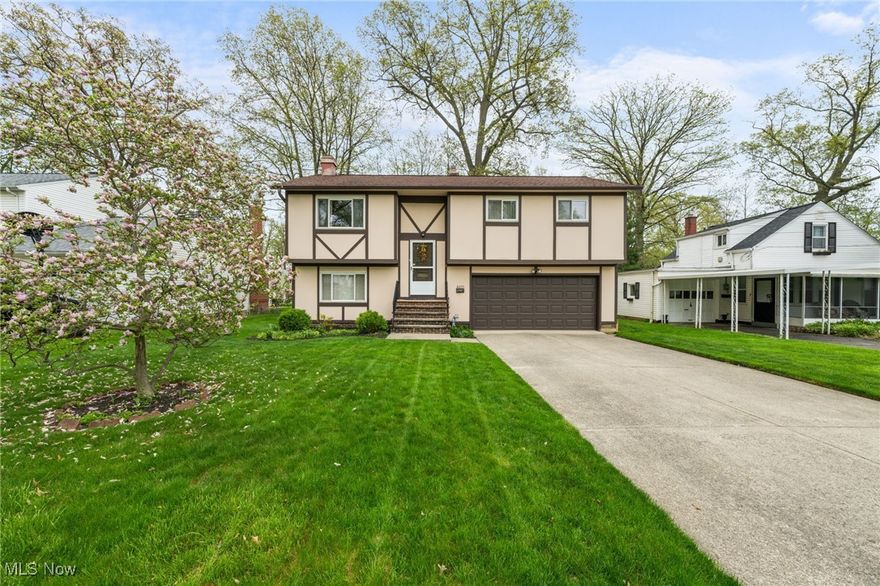 GET A CLOSE UP LOOK at this amazing split level in North Olmsted.  This gorgeous 4 bedroom, 1.5 bathroom gem has been meticulously and is completely move in ready.  The first floor features a large carpeted living/dining room cozy for any of your needs.  Kitchen is well kept (ALL APPLIANCES STAY) boasting tons of storage/counter space! The home features 3 large bedrooms with tons of closet space on the main floor.  Lower level features a 4th bedroom/rec room with wood burning fireplace and half bath.  Did I mention how perfectly kept this house is?  Walk out the new sliding door to the fully fenced in, massive back yard where you can envision your spring/summer/fall nights for all the activities you can dream of.  Large 2 car attached garage for the winter!  Updated HVAC, electrical and Hot water tank 2017.  Bring your buyers to this beauty!  They will not want to miss out!