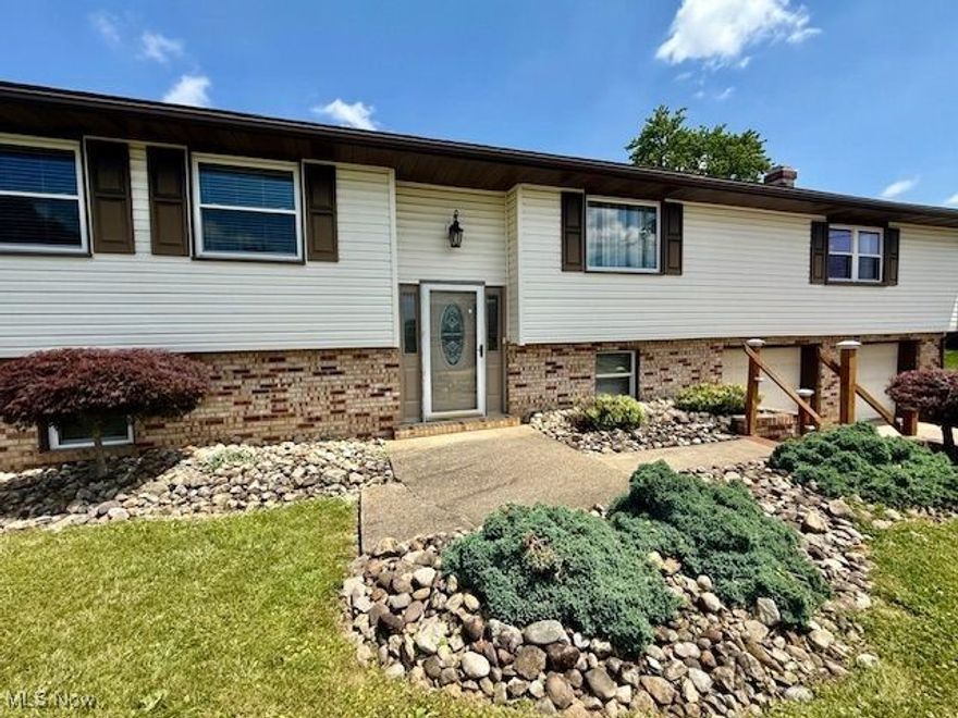 Freshly painted! This spacious, attractive 3 BR, 1 BA bi-level home gives you an affordable opportunity to upgrade your living space in a nice neighborhood. The large lot features an in-ground swimming pool with fence as well as a fenced yard area for pets. A huge family room addition above the 2-car garage offers a wood burning fireplace with built in wood storage. There's a breakfast bar in the eat-in-kitchen that includes a newer stove. From the entryway, enjoy a formal living room or dining room area, as you prefer. Two smaller bedrooms were combined to make a large room with double closets. A second main floor bedroom has laundry hookups, which can be removed. The third bedroom on the lower level has just been refinished and could be a large master suite off of the rec room. This is a lot of house for the money.