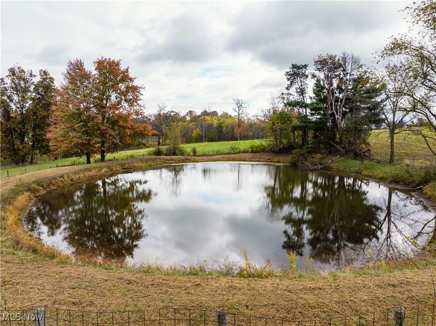Auction November 29th. This is some of the PRIMEST land in the county or state! The land has Commercial and Residential Sites, with some gorgeous spots  Parcel 2: 6.121 Acres with a Pond. What a wonderful spot for your Dream House.