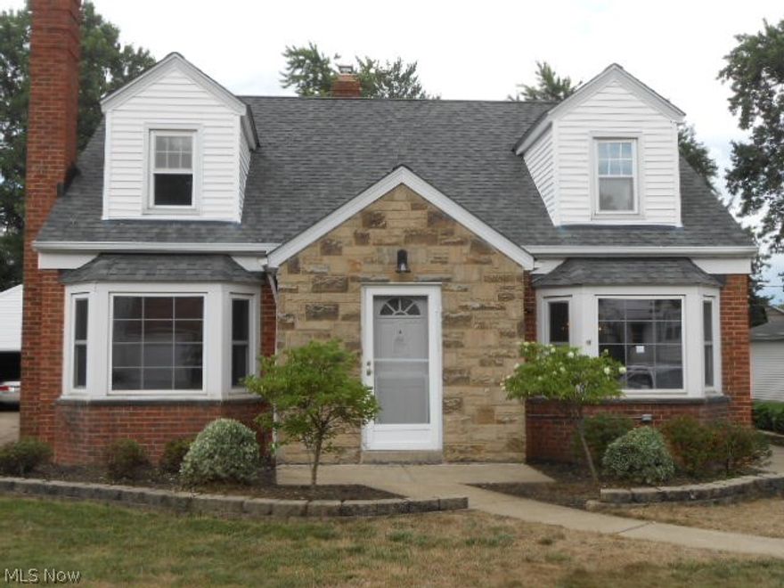 Super Sharp brick and vinyl sided cape cod style home.  Great exterior curb appeal with bay windows and stone accented entrance.  Quiet low traffic street.  Attached one car garage.  Partially fenced rear yard.  Nice floor plan with generous room sizes.  Modern kitchen, and clean home overall.  Full baths on first and second floors.  You'll fall in love with this one!