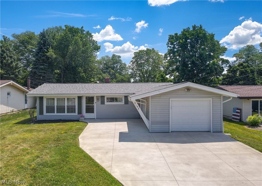 Welcome to 9193 Milford Dr in beautiful Northfield Ohio. Situated just a short drive from Cuyahoga Valley National Park, this majestic ranch is also in close proximity to the MGM Northfield Park, shopping and dining at Macedonia Commons, and highway access at Route 8. As you arrive at the home you will be escorted up a brand new concrete driveway. Enter through the front door to a spacious family room with vaulted ceilings, exposed beam, and picture window that allows for an abundance of natural light. Continuing on you will arrive at the kitchen area, equipped with double sink, amble cabinet space, and pass through window to the great room. The great room is a wonderful addition with featuring a gorgeous brick fireplace. At the other end of the house you will find three good sized bedrooms with closets and a full bath. The backyard is an oasis on its own, offering a tranquil patio to enjoy the sunlight. Absolutely lovely home just waiting for you to make it home. New roof, gutters, and foam insulation. FVAC, HW - 2017.