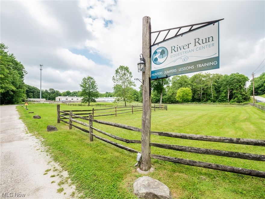 Welcome to River Run Equestrian Center! A magnificent property by the river, spanning just over 18 acres. This property offers 3 meticulously maintained fenced-in pastures, 4 dry lot turn out areas, a sand turn out area and 3 km of trails. These well-designed spaces provide ample room for grazing, exercise, and training. The heart of this equestrian paradise is the 44-stall steel construction barn, which encompasses every essential feature desired by discerning horse enthusiasts. Step inside to discover 4 heated and ac tack rooms, 2 restrooms, lounge area, and conveniently located laundry room. The feed room and hay loft with full length conveyor and hay elevator exemplify the dedication to efficiency and ease of operations. The spacious 12 by 12 stalls offer Nelson automatic watering system, heated farrier shed, and much more. Have the freedom of year-round riding with the expansive 80 by 200 indoor arena. This arena offers a perfect setting for training, competitions, and joyful ride