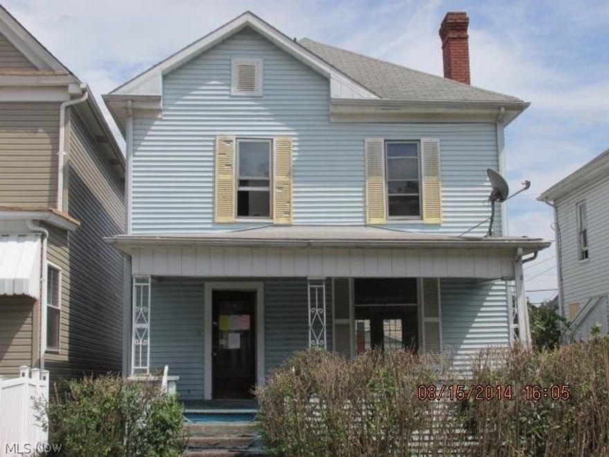 Large 2 story home with covered front porch and a rear deck. 1 car detached garage in the rear of the home. This is a Fannie Mae HomePath property.
