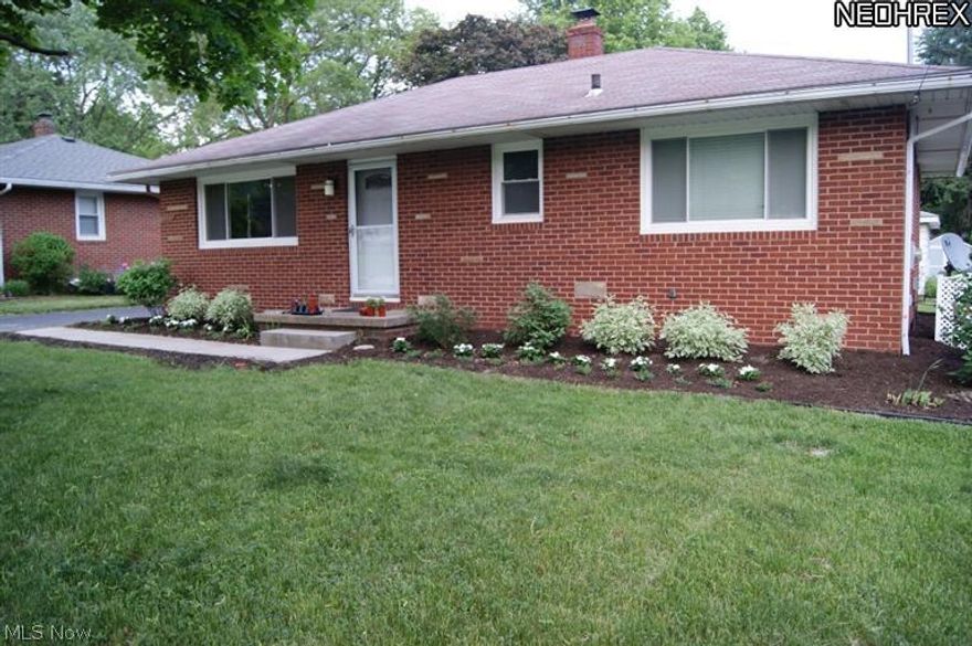 Sharp Brick Ranch in desirable Stow neighborhood in excellent condition! Living rm with large picture window welcoming the sunlight and hardwood floors that continue into the 3 bedrooms, Full Bath beautifully updated. Bright updated kitchen with ample cabinets, new floor, stainless appliances and dining area. Lower level nicely finished rec room and an office all with new carpet and an updated 1/2 bath. Newer windows & doors, electric panel, water heater, added insulation and freshly painted. Plus a 2 car garage,deep drivway with extra parking space, a shed and a beautiful large backyard.
