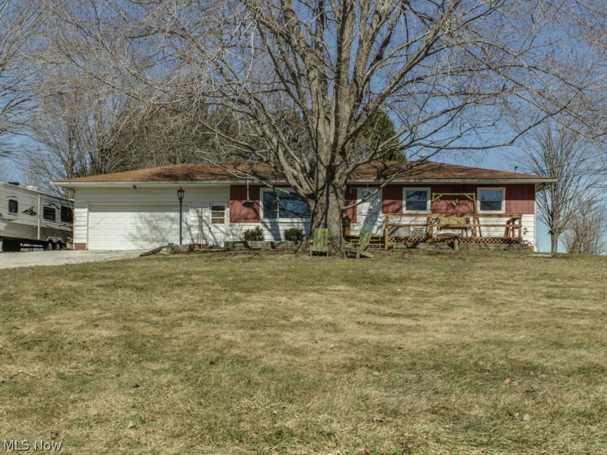 Located in Rootstown Township, this warm and welcoming 3 bedroom 2 bath home has been lovingly cared for and is perfect for an animal lover! Situated on 11 acres, if you are looking for land, this is your home. When you walk through the front door you enter into the cozy family room. There is a picture window which is ideal for watching nature or enjoying the peacefulness of the field across the street. The kitchen has beautiful granite countertops that were recently added and a dinette space large enough to host the holidays! Off of the dinette is the sunroom where you can enjoy the beauty of over 5 acres of land. There is a 24x32 horse barn built in 11-01 with electric and water. There is enough space for up to 3 horses and a pasture / Run-In area. The basement is nearly finished and could be a great rec room. There is space outside for a RV/Camper. Updates: Roof-2013, Windows-2011, Electric-2002, Waterproofing-2003. Propane Tank owned by owner and will stay with property, electric s