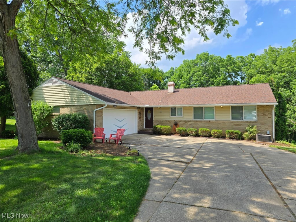 Seller’s plans changed after a top-quality renovation—and now YOU get to benefit from the transformation! Over 3,000 sq ft of finished space in this 4-bed, 3-bath ranch with a walk-out lower level in Northampton/Woodridge School District. Open-concept main floor with 2025 kitchen remodel—quartzite counters, soft-close maple cabinets, stainless appliances. Great Room with picture windows, spacious bedrooms, and primary suite with full bath plus guest bath. Walk-out lower level includes a large bonus room, large family room, newly finished bath, and flexible living space including oversized crawlspace. Serene backyard features trees and a stream. Roomy 2.5 car garage with it's own dedicated 100-amp service. New kitchen, bath, gutters, electric panel (200 amp), flooring (2023–2025). Near Blossom, CVNP, Market District & major highways, this home delivers space, location and lifestyle in one perfect package.
