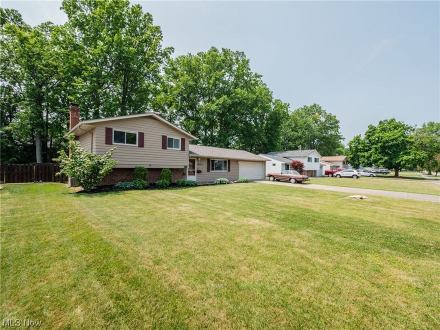 Your new home awaits on this quiet, tree-lined street. The property boasts a large, fenced-in yard and mature landscaping. Valuable updates include a new roof (2021) and recently remodeled kitchen (2021) with stainless steel appliances. There are vast living spaces on the main and lower floors, along with three bedrooms and a full bathroom upstairs. A half bath is available alongside the family room and laundry on the lower level. The backyard can be accessed from two different floors and the attached garage features a garage door opener with battery backup. Conveniently located near I-480 and other popular retail, recreation, and restaurant attractions of North Olmsted. Home warranty included!