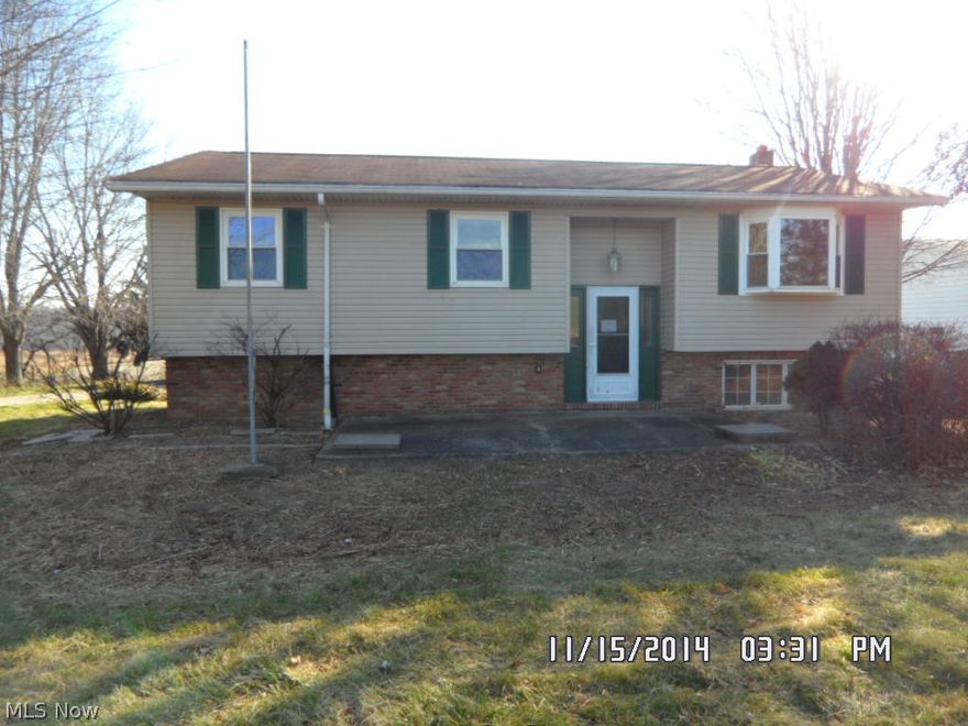 Plenty of potential in this country bi-level! An attached garage is great for the family car, and the detached building with electric, paved floor and garage door will hold at least 4 cars, ideal for hobbies and storage or a home business. Inside, this home will need some vision to improve the appeal. Worth a look! Great lot! This property qualifies for Freddie Mac First Look Initiative through 12-24-14. Owner occupant offers will be considered during this period.