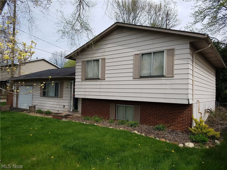 The three most important factors in real estate are location, location, and location; and that's what you have here, an excellent location. There's a terrific opportunity with this 3 bedroom, 1.5 bath split level home in Perry Township. The sliding glass door opens to an excellent sized grassy fenced-in backyard. The main level has a spacious living room that leads to a dining room and kitchen. The upper level has 3 roomy bedrooms, a full hall bath and a half master bath. The lower level has a brick fireplace and mantel, laundry/utility room, storage room and walk out steel door. There's lots of potential here with a little TLC. Come check it out for yourself, schedule a walk-through before it's gone!