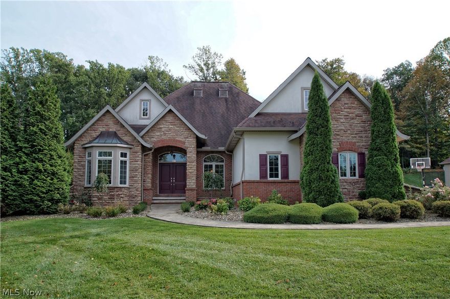 This stunning Little Mountain ranch home has it all!  Gourmet kitchen - large master suite with 2 walk in closets - guest suite - Jack and Jill bedrooms with shared full bath and multiple walk in closets - bonus room/possible 5th bedroom/living suite with full bath and walk in closet - music room - formal office space - formal dining room - finished basement - bar - wine room - theater room - exercise room - in ground heated 44' pool - outdoor fireplace and beautiful outdoor living areas.  This home is fabulous... come see it for yourself!  You won't be disappointed.  As soon as you walk in - you will see the level of craftsmanship and attention to detail that flows through the entire home from custom tile and moldings to hand picked granite and fixtures.  Entertaining will be a breeze with the indoor/outdoor space and wonderful layout.  Love to play golf? Little Mountain Country Club is an award wining 18 hole golf course!  Play a round and kick back at the club house or head home for a workout in your exercise room then take a dip in the heated 44' pool.  Finish the night off by the fire with friends and cocktails or take in a movie in you own home theater.  This home can live large or it can be cozy and intimate - whatever you feel like.  Don't miss it! First floor laundry and garage foyer finish out the amazing floor plan.