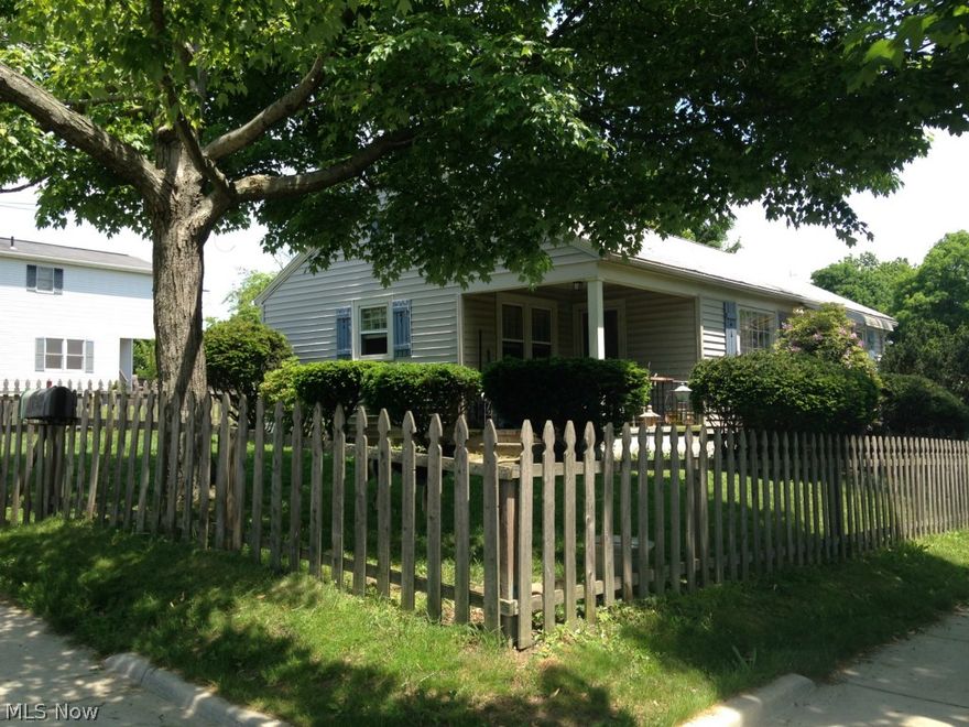 LOCATION, LOCATION, LOCATION! What a great place to call home! Walking distance to grade school, KSU bus route, hike & bike trail! Near parks and amenities, from a pizza shop to a convenient store.  Lots of trees & sidewalks - a real feel of community! Make this house your home! Lounge on the back deck while the kids/dogs romp in the totally fenced-in yard. In winter, the attached garage will keep the snow off your car. Inside, the living room has a quaint artificial fireplace, wood flooring, and plenty of room to relax. The kitchen has brand new flooring, countertops and sink. Use all 3 bedrooms, or make one your in-home office. Downstairs, there's a finished rec room with ceramic flooring and wood-burning fireplace, plus a half-bath, a utility room with workbench, and separate laundry room. Get ready to move in when you look at this home!