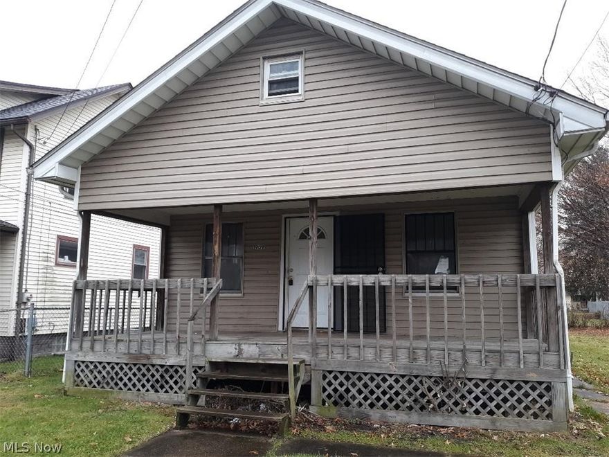 Cozy 2 bedroom, 1 bath home with attached 1 car garage. Needs some tlc.