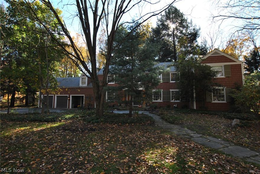 Stunning and elegant, one-of-a-kind, custom built colonial. Totally updated, true pride of ownership. Prime location in private 100 year old community. Gorgeous 1.63 acre lot w/breathtaking views, overlooks Metro Parks. Spectacular open floor plan w/extensive crown moldings, 6 paneled wood doors, wood floors and custom built-ins. 2-story foyer w/custom staircase. Fabulous library/office w/beautiful custom FPlc, wood paneled walls & ceiling. Amazing great room/Family rm w/custom FPlc, and wall of windows. Outstanding dining rm with hearth rm/living rm overlooking peaceful wooded backyard. Warm cozy kitchen w/custom cabinets, all appliances stay. Spectacular 2nd floor w/newer spacious bonus rm. Stunning master suite w/glamour bath. 4 full baths on 2nd floor and 4 luxury bedrooms. Finished walk-out lower level w/recreation rm and storage area. Large beautiful 3-season sun rm. 2-car attached garage, 1 1/2 detached garage plus storage shed. Professionally landscaped lot. A True Must See! Pr