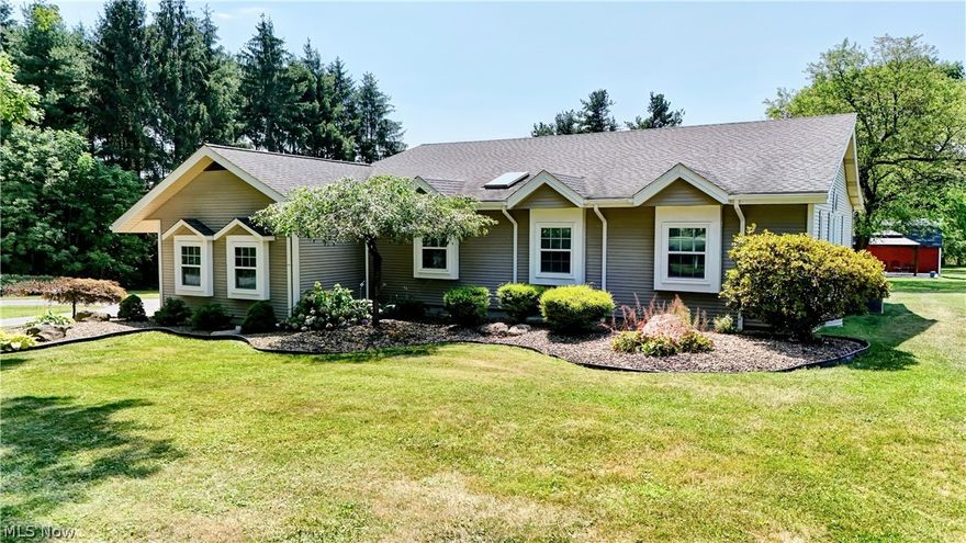 This Precious Ranch-Style Home will Delight many an it sits on almost 2.5 Acres!! 3 Bedrooms with space for more. Updated Kitchen and Appliances provides plenty of Cabinetry for storage and Granite Counter Tops spread out for Buffet Style Dining. Enjoy a Meal with an Open View of the Large Kitchen. Laundry is accessed on the First Level, connected to a Full Bath and Open Mud Room. Two Suite Style Bedrooms allow ample Privacy with Full Baths. Primary Bedroom is absolutely enormous with Beautiful Wooded Cathedral Ceiling, Walk-in Closet and Bath with a Soaking Tub. Open Living Room with a Cathedral Ceiling, enfolds into the Finished portion of the Basement. Completed with a Walkout Entry. Enjoy the Convenience of a Half Circle Paved Drive. Six Car Garage, Tall enough to store a RV/Boat. Use this glorious space for Entertaining as it has Banquet area, Heated and Tile Flooring. 2 Extra Sheds/Barns on Property with a Gazebo out back to relax under. Take Pride in the Privacy of Owning almost 2.5 Beautiful Acres. Many, Many Updates and Special Features Here. Whole House Generator Hook-up, Reverse Osmosis Water Treatment System, finished basement and so much more... Come live the simple Life and Enjoy what Raccoon Rd has to offer. Just Minutes from Shopping, Dining and access to Freeways.