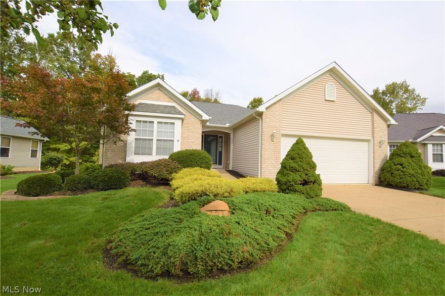 Welcome home to 723 Robins Gate! This meticulously maintained condo is beautiful from the inside out. Step into the front door to immediately notice the laminate wood floors, Cathedral ceiling with skylights, tiled fireplace, and open layout. The living room openly flows into the dining room area (which has sliding glass doors to the balcony) and the beautiful, bright kitchen. The kitchen has stainless steel appliances, white cabinets, and a sparkling counter top complete with a neutral back splash. Off the kitchen is a laundry room with a sink, some cabinets, and garage access. You will fall in love with the spacious owner's suite, which has sliding glass doors to an elevated screen-in balcony. The owner's suite bathroom is large with lots of storage space; and the closet is huge! Basement is partially finished, complete with a family room and a bathroom. Outside access from basement. Along with the gorgeous interior, the exterior is beautiful and has outstanding curb appeal. Don't le