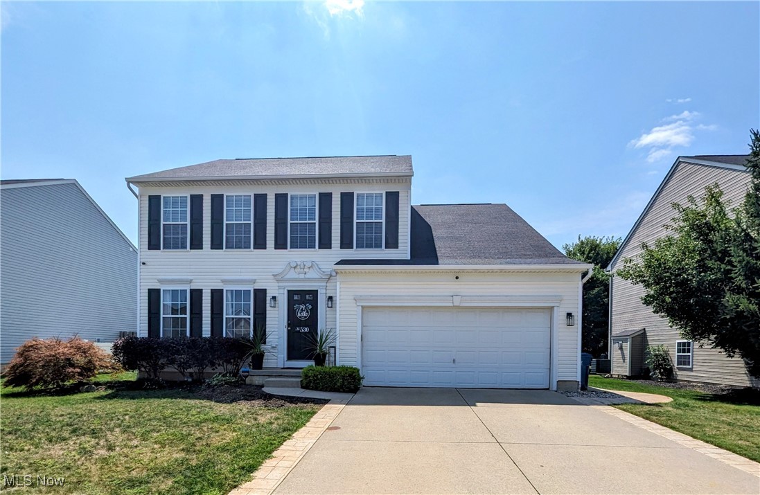 A beautifully updated and well maintained 4 bedroom colonial in Heisley Park! This 2.5 bath home features an open floor plan with a laundry room and half bath on the main level! Tastefully detailed and decorated! Updated paint throughout! Upon entry, the foyer leads to a large living room which opens up to the generously sized great room and eat-in kitchen! Nice finishes on the kitchen island! Ample counter and storage space throughout the entire kitchen! Patio doors lead from the kitchen to the backyard patio! The upstairs features an exceptionally sized master bedroom boasting its own master bathroom and walk in closet! An additional full bath accommodates the other three bedrooms! An abundance of windows allow plenty of natural light throughout the home! The full unfinished basement has a full bath roughed in! Attached two car garage! Make this beautiful home your own!