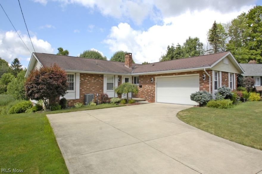 Best value in Grafton*Lovely 3 bed ranch*clean as a whistle*spacious eat in kitchen with pantry and additional built in shelving* two stone fireplaces*large family room*wonderful sun room overlooking green area*first floor laundry*large recreation room in lower level with walkout to back yard and nice work shop*loads of storage in large lower level and in attic with pull down stairs*oversized 2 car garage with plenty of storage and man door to the yard*many updates including HVAC in 2006*Call for your private showing today