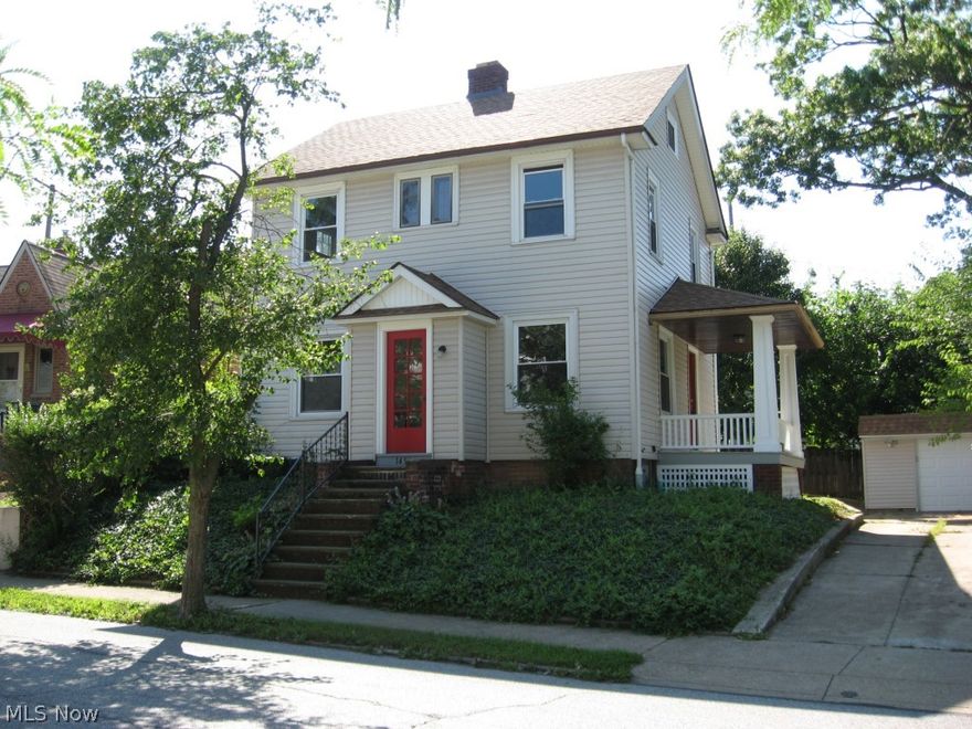 Charming Lakewood Colonial with beautiful hardwood floors in living room and dining room.  Large, private porch off of living room.  Beautiful dining room with built-in China cabinets showcasing original leaded-glass doors.  Spacious kitchen boasting new counter tops, cabinets and flooring.  All kitchen appliances included.  Great kitchen for cooking!  Large open basement with finished walls.  Upgraded electrical and plumbing.  Three bedrooms, all freshly painted and with brand new carpeting.   New bathroom with all new fixtures and a beautiful ceramic bath tub surround.  Spacious linen closet in bathroom as well.  Finished third floor with brand new carpeting - great space for office or work-at-home studio space.   Private back yard, fully fenced, with stone patio.  Perfect back yard for those family get gatherings!  Close to schools, only blocks from award-winning Lakewood High School.  Close to public transportation, shopping and Lakewood Center.  Enjoy city living in the wonderful,