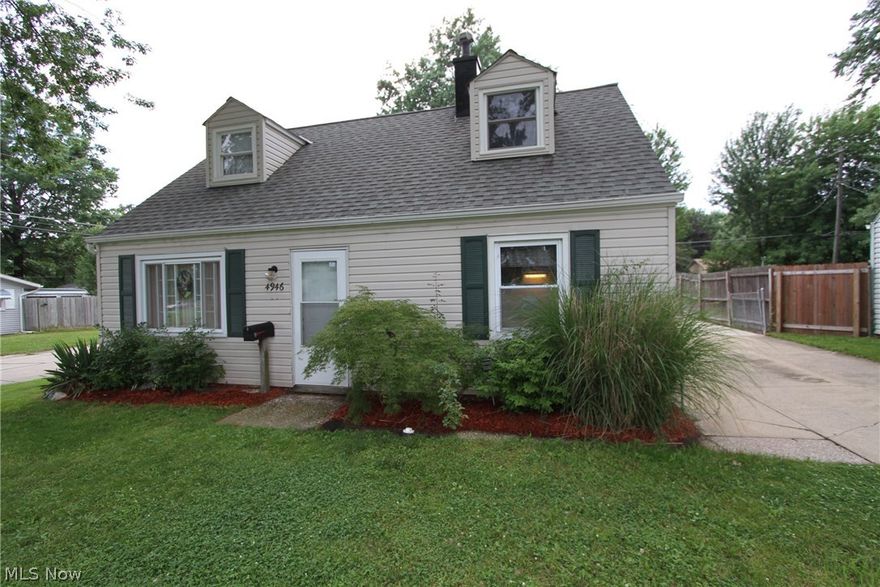 Meticulously cared for over 1300 SF cape featuring huge living room and dining room with beautiful woodwork throughout. Nice eat in kitchen with newer cabinets, countertops and floors. 1st floor master suite and 2 bedrooms up. Oversized 2.5 car garage. Partially fenced in yard. A must see!!