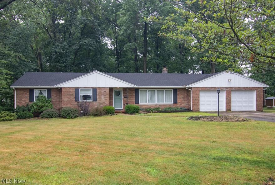 Welcome to this one-owner Brick Ranch-Style home located at 768 E Spruce Street in Ravenna City.  This 2,348 sq. ft. home features 3 bedrooms, and 2 Full Baths in the main part of the home along with a spacious kitchen with LVT flooring, formal dining room, large family room, and a Den/4 seasons Sunroom.  In addition, the home boasts an in-law suite with sitting room, kitchenette/dining area, bedroom and a full bathroom.  Would make a great primary suite!  There is a partially finished basement that was recently waterproofed, 2 car attached garage and .58 of an acre City Lot.  Don't miss this Great Home!