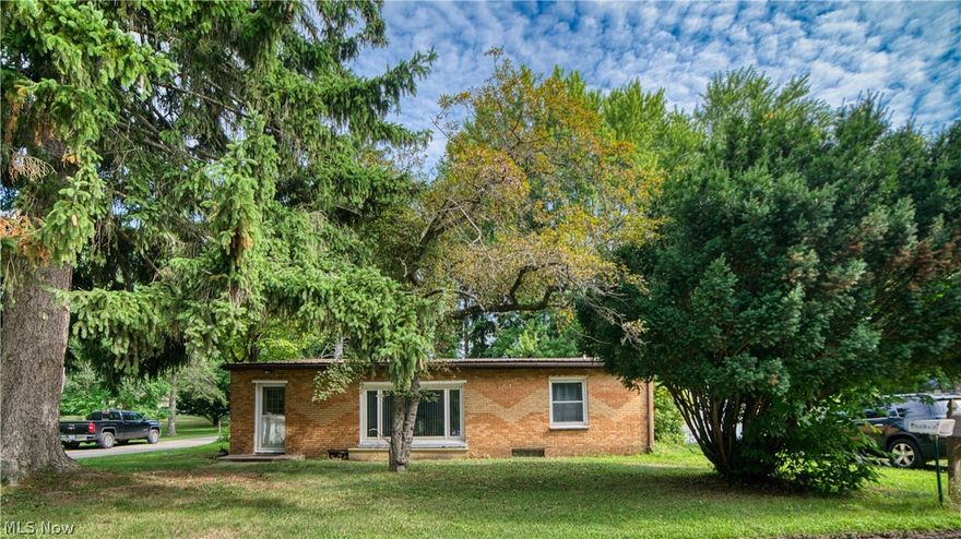 Take a look at this SINGLE STORY brick home in beautiful Conneaut, OH! 3 big, carpeted bedrooms all on the main floor, a large living room and generous eat-in kitchen. There are hook-ups in the bathroom for a washer and dryer as well! The full basement offers opportunity for additional space ready to finish to your specifications. A covered patio to the back of the home with a partially fenced back yard gives ample room to enjoy the outdoors! A solidly built single car garage with a concrete floor adds convenient storage for your car, toys or extras. Come see this one for yourself today!