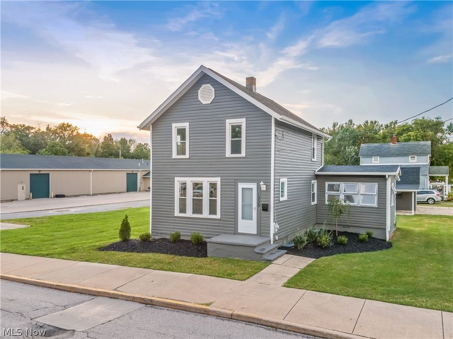 Welcome to 1229 Wooster Road, W, Barberton. Absolutely stunning colonial! So many updates! Kitchen features granite counters, stainless steel new appliances, and new cabinetry. First floor master bedroom with a new bath and spacious living room all with beautiful wood flooring. Upstairs is complete with 2 bedrooms and one full new bath and new carpeting throughout. Enclosed for extra relaxation. Exterior updates include new vinly siding, windows and roof. Electric and Plumbing updated. One car garage plus a carport area complete the package! Call today to see 1229 Wooster Road W, Barberton!