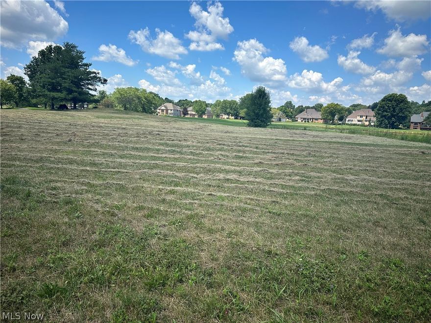 FINAL PHASE! CHECK IT OUT!! Whether you are interested in the deep history of this amazing 381 acre private Country Club and amazing neighborhood or just looking for a convenient lifestyle with all the bells and whistles, you have found your place!  This amazing building lot nestled on a dead end street overlooking the 14th hole and is just one of a limited number of lots still remaining.  Bring your builder and build your future home in the heart of luxury in this exclusive gated community.  Nestled amidst lush, meticulously landscaped grounds, this vacant lot offers the perfect canvas for your dream residence.  Each lot boast breathtaking views and us surrounded by a world-class Jack Nicklaus designed signature golf course where rolling greens and serene water features provide a picturesque back drop.  This community is designed for  those who appreciate the finer things in life.  Residents enjoy unparalleled amenities including a state of the art fitness center, kids club, an amazing pool, tennis and pickleball courts and so much more.  The elegant clubhouse serves as a social hub, featuring multiple gourmet dining options, a luxurious health spa and a calendar full of events and activities.  Well being and privacy are paramount in our gated enclave, ensuring a tranquil living environment.  Seize this rare opportunity to build your custom home in a setting that combines natural beauty, modern conveniences and an active vibrant community.  Welcome to a life of sophistication and leisure.  Welcome to Glenmoor!!  EXTRA EXTRA!!  When you purchase this lot you receive 1.  a full golf membership initiation fee 2. One year full golf membership 3. One full year of HOA dues 4. Choice of NEW men or woman New Drivers (golf club) or putter 5. One case of golf balls and 6. 12 - golf guest passes for 18 holes.