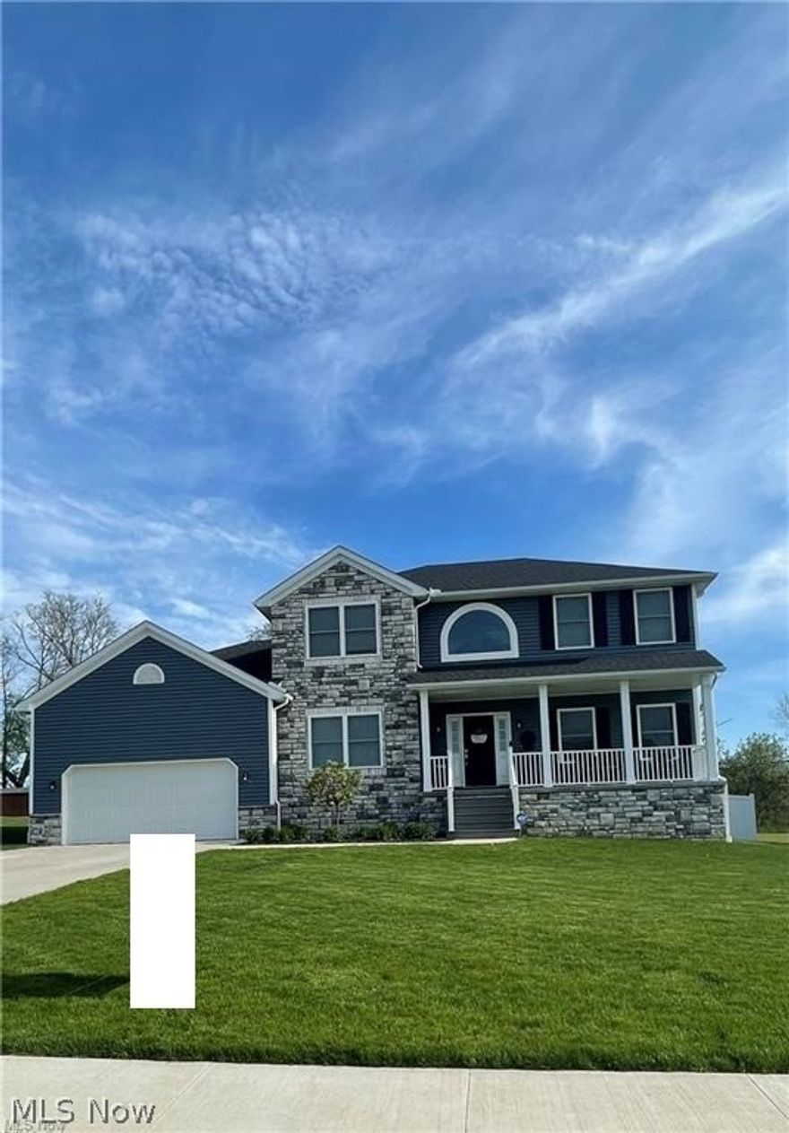 This beautiful, newly built home offers everything you could want and more. On top of being included in the Columbiana Tax Abatement, it is on a quiet street in a beautiful neighborhood. Upon entering, you are greeted by a large two story foyer with a plant ledge and window showcasing the chandelier. Straight ahead you will find an open concept kitchen, dinette, family room with an island for extra storage and seating. On the first floor you will also find a formal dining room, formal living room, and a laundry room. Upstairs you will find four bedrooms, the master has a large walk in closet and a large bathroom with double vanities and a soaker tub for relaxing bubble baths. The fenced in backyard offers a fire pit, as well as a large Trex deck for get togethers(20x24 with and attached 8x8 octagon for the grill and smoker). Welcome home!
