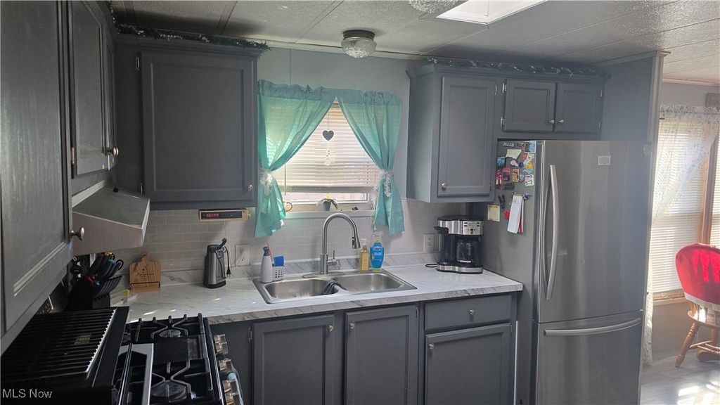 Photo of 3218 state route 82 #80, Mantua, OH 44255 (MLS # 5178293)