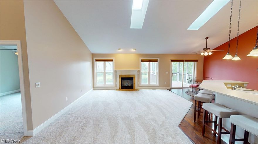 Waterfront ranch home in the desirable Lakes at Franklin Mills neighborhood- with numerous stocked ponds, walking/bike trail, sidewalks, park and nature trails! True first floor living with lawncare and snow removal taken care of for you. The open concept of this 4-bedroom home is ideal for entertaining and accessibility. The cathedral ceiling on the main floor gives soaring ceiling heights and the wall of windows brings in an abundance of natural light. There are two dining areas, and the eat-in kitchen flows perfectly to both dining spaces. The closed in patio off the main living area is the perfect spot for drinking your morning coffee and enjoying the water view. The guest bedroom is conveniently located in the front of the house, near the full guest bathroom. The primary bedroom is spacious and overlooks the water with an oversized walk-in closet and an updated full bathroom with a dual vanity and walk-in shower. Downstairs in the fully finished lower level are two additional bedrooms with large closets, a full bathroom and an oversized recreation room with a full wet bar! Outside there is an additional sitting area and lots of green space on the water. In additional to all of the living area, there is a ton of storage space! Call TODAY for your privae showing, before this one is GONE!