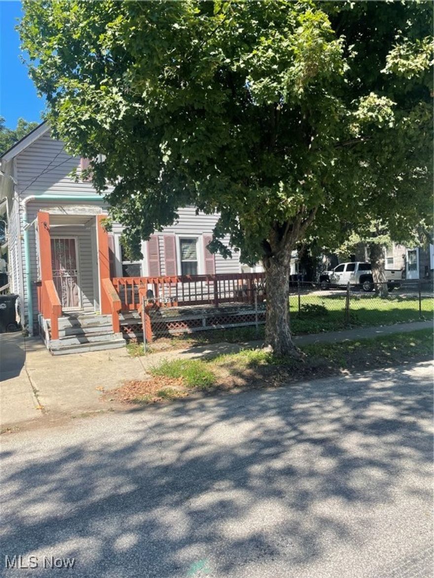 Great investment opportunity! Downstairs has huge kitchen with island, 2 bedrooms, large dining & living rooms! Upstairs has 2 bedrooms, bath, living room, and storage room. Wheelchair ramp! Paved driveway & 1-car garage.