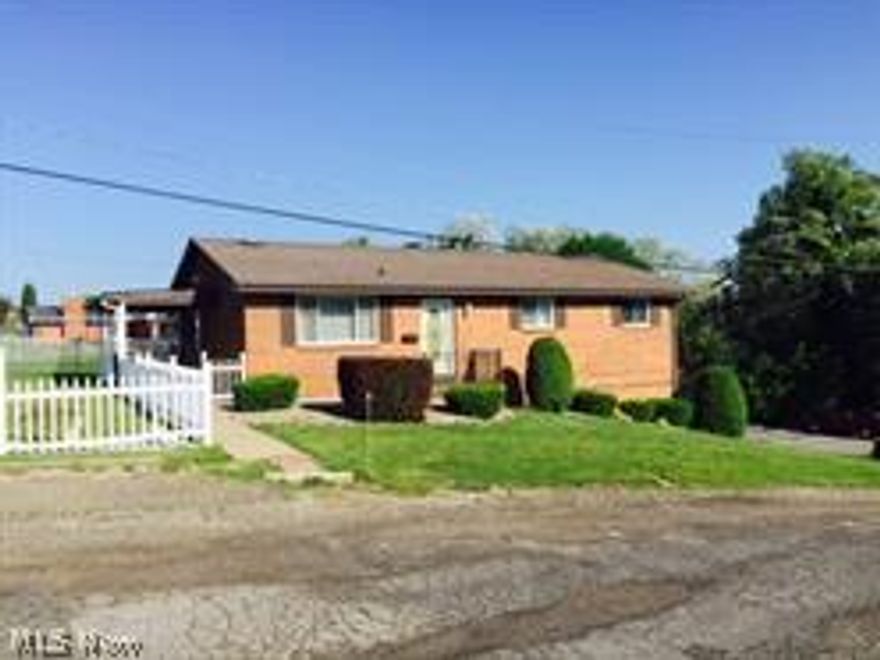 VERY NEAT AND CLEAN WITH FENCED YARD.. THIS 3 BEDROOM BRICK HAS NEWER WINDOWS, DOORS,SLIDER & STORM DOORS,HEAT PUMP 2014,WATER TANK 2010 NEWER WHITE VINYL FENCING, 2 CAR TANDUM GARAGE,200 AMP SERVICE, CENTRALLY LOCATED.