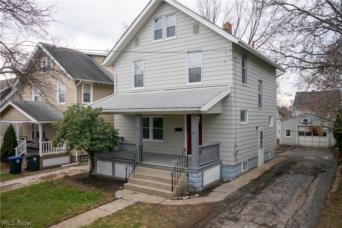 Don't miss out on this spacious 3 bedroom Akron North Hill home. Just renovated and ready for you to move in and make it your own! Fresh paint from top to bottom and new flooring throughout the entire home! The first floor features a large living room with a fireplace, a dining room with built-in cabinets and a new ceiling fan, completely remodeled kitchen, and a breakfast nook. The second floor includes 3 bedrooms and a completely remodeled full bathroom. The third floor is finished for additional living space and storage. Enjoy the outdoors on the freshly stained front porch and rear deck. The spacious 1 car garage has plenty of room for your vehicle and extra storage. Additional updates include fresh paint on the exterior and garage, new windows, several new interior doors and exterior doors, new roof on main part of the home, new light fixtures throughout, new electric panel, outlets, and light switches, and a new toilet in the basement. The basement is waterproofed and there is a