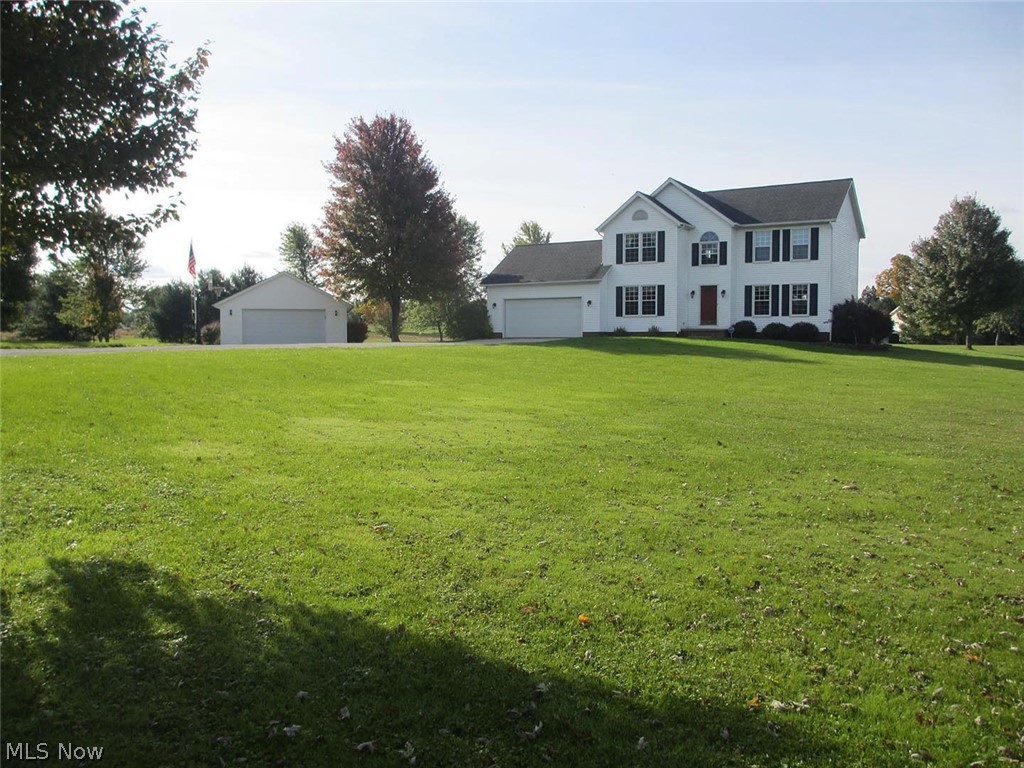 Country Living at its Best! Well cared for one owner home situated on 5 acres in Marlboro Twp. with an approx one acre pond. Nice private setting with detached 24 x 32 pole building. Nice open oak kitchen with sliding door to rear 25 x 16 wood deck overlooking the large back yard. Recent updates include: waterproofed basement (2007), finished basement (2007), 14 windows replaced (2009), roof shingles (2012), Pergo laminate flooring (2017), new furnace and A/C (2018). This home will not disappoint! Call for private showing. 1.5 miles from Marlington High School.