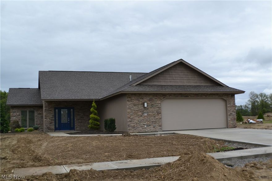 Custom home under construction.  Beautiful custom-built home in our newest Phase.  Features include a wonderful vaulted ceiling great room with generous formal dining area and wet bar, fantastic kitchen with snack bar, skylight, vaulted ceiling, upgraded appliances, granite counter tops, tile back splash, custom cabinets and walk-in pantry, two large bedrooms - master with full bath and walk-in dressing room with custom wardrobe chests, library study, spacious laundry room, tankless water heater, nine foot ceilings, enclosed screen porch, patio, over-sized two car insulated garage with floor drain, hot and cold water, pegboard, pull-down stairs to floored overhead storage, loads of storage and custom landscaping.  Subdivision clubhouse, fitness center, play area, Olympic-sized pool and children's pool.  Numerous single family and cluster home building sites are available.