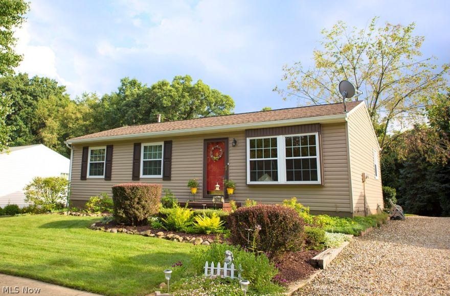 Three bedroom ranch completely updated in a peaceful setting. Home features outdoor fountain, comfortable and open floor plan, newer fixtures, and a finished basement with a bonus area for an office or sitting room. The fully applianced kitchen offers plenty of cabinets & a breakfast bar. Bedrooms are large and offer good sized closets and ample space to unwind. Enjoy the wood deck in the private backyard. 2.5 car garage & home warranty included. Updates include new siding ('12), new roof ('12), new shutters and downspouts ('12), new carpet, new flooring, remodeled bathroom on main floor. Move right into this beautiful home. Call today for a private showing.