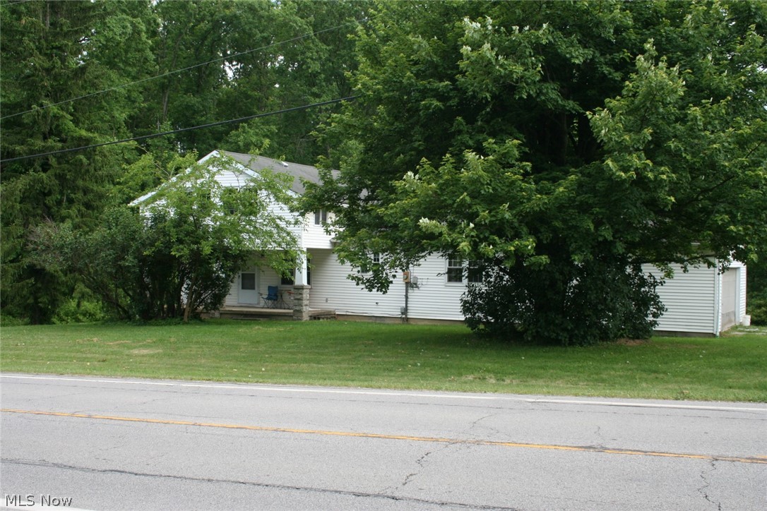 Bring your dirt bikes and 4 wheelers! 10.5 mostly wooded acres to make trails for your toys. Livestock is permitted. This home needs a little tlc. Large eat-in kitchen, formal dining room and living room with wood burning fireplace. First floor master bedroom with bath and 1st floor laundry. Two car attached garage and a 32x24 pole barn. Call today!!