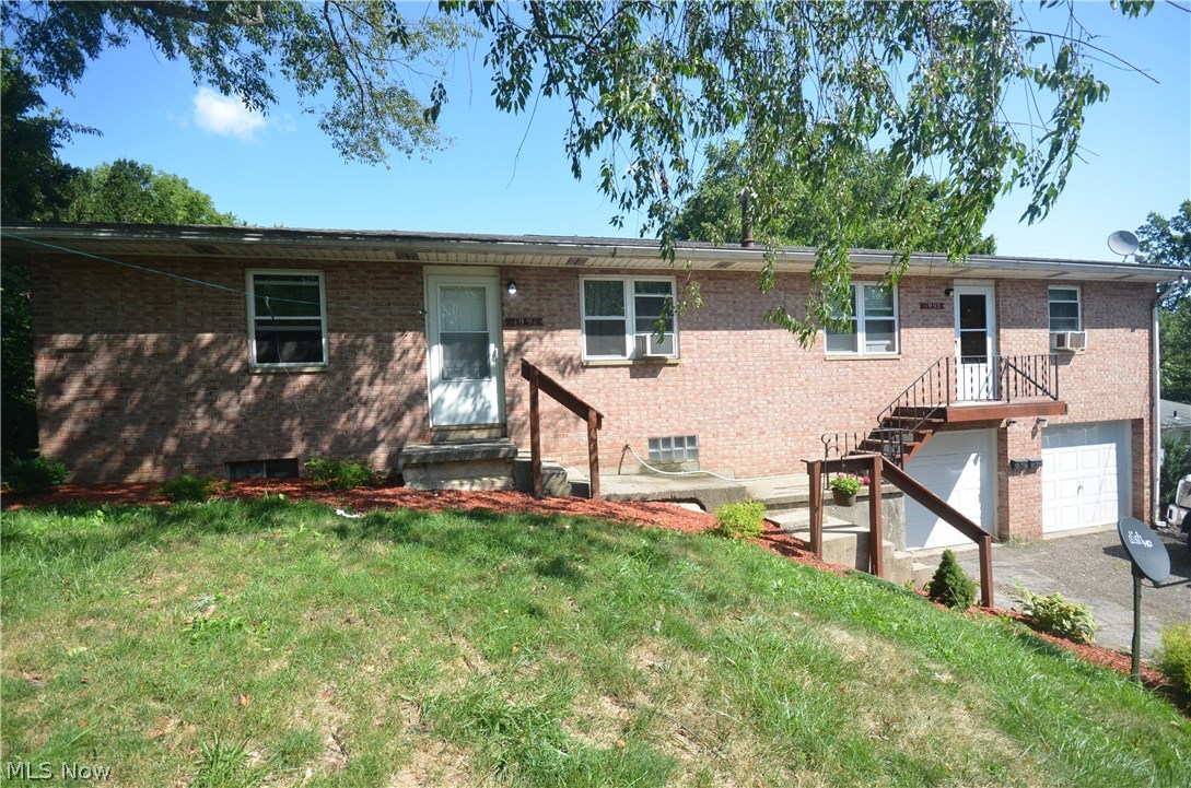 Ellet Schools! All brick 2 unit- each side with 2 bd, 1 bth, 1 car attached garage & basement w laundry area! Private location at the end of a dead end street- living rm w great daylight from the large window and an eat in kitchen with range and refrigerator in each unit that convey with the property (owned by landlord). Nicely updated full bathrooms w shower/tub and 2 bedrooms. The central stairway leads down to the basement where each unit has their own section of basement- complete with laundry area (both gas and electric hookups available) and a utility sink. The garage has a wall down the middle to divide each side and has glass block windows. The garage is very deep for extra storage too. Updates include: ’18 Hot Water Tank for 1991. ’28 Bathroom updated for 1991. ’17 Windows Throughout. ’17 Hot Water Tank for 1993.’16 Electric panels on each side. ’15 Overhead Garage Doors. ’14 Refinished hardwood for 1991. ’13 Basement painted. Roof estimated 12 years old. Owner pays Water/Sewe