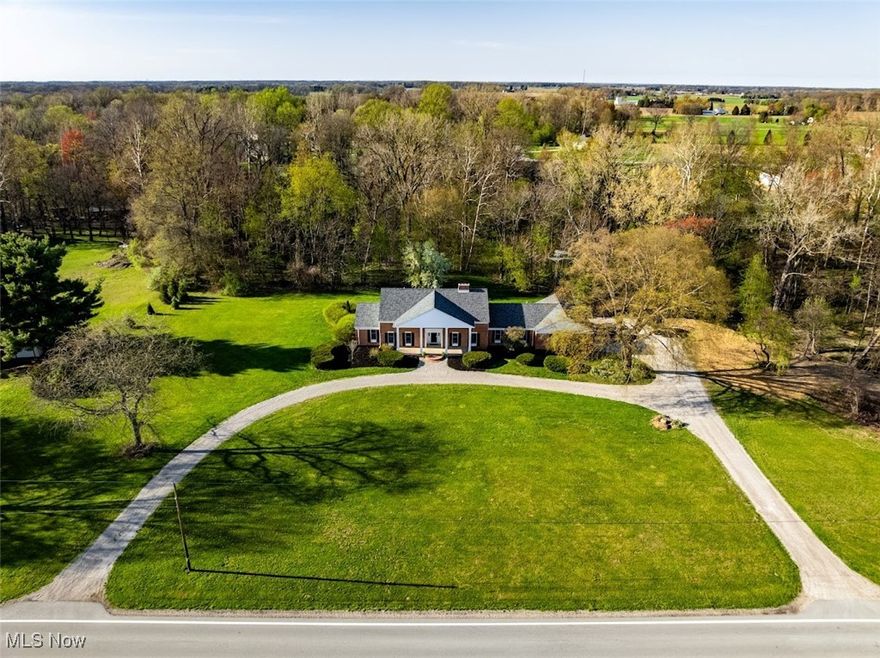 Stately 5-bed, 3-bath brick home nestled on serene 7.68 acre property...offering the perfect blend of luxury, comfort & space! Main floor features two cozy fireplaces, ideal for relaxing evenings, and spacious layout designed for both entertaining & everyday living. Many updates include master bath w/ double closets, custom tile & walk-in shower. Recently finished 2nd floor offers additional 1,500+ sq. ft. of living space w/ two inviting bedrooms, each w/ brand new windows to allow plenty of natural light. This new space also includes a rec room & the potential for a 4th bathroom (plumbed at wall). Large basement provides endless potential to customize to your needs, whether it's a workshop, game room, or home gym! Outside, enjoy nature's beauty in the wooded ravine w/ stream just beyond tree line, as well as terrific sledding on access lane to stream! Don't miss this opportunity to own a slice of country paradise. Edison Schools! Heated 3-car attached garage! Ask for Feature Sheet!