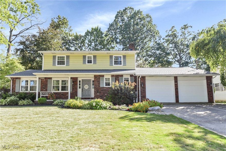 Prepare to be moved! Welcome to this charming 4-bedroom, 2.5-bath Colonial offering 2,202 sq. ft. of classic comfort and timeless appeal. This beautiful two-story home combines elegant details with a warm, inviting atmosphere, perfect for family living and entertaining.  Step inside the inviting foyer, leading to a cozy living area featuring a fireplace framed in beautiful brick. Newer windows and custom blinds fill the space with natural light, while neutral tones and newer carpeting on the stairs, hallway, and master bedroom create a warm and welcoming atmosphere. The kitchen and dining areas blend practicality with timeless charm, featuring wood cabinetry, white countertops, and newer stainless steel appliances. A cozy breakfast nook connects to the formal dining room, enhanced by another bay window that frames peaceful backyard views an ideal space for family meals or entertaining guests. The spacious living room offers a classic, comfortable setting, for movie nights or gatherings. A main-level laundry room adds everyday convenience. Upstairs, you’ll find four generous bedrooms, including a master suite with a redone private bathroom and an upgraded closet system. The main hall bath has also been refreshed with a new sink, toilet, and Bath Fitter tub surround. The basement provides additional space and ample storage. Step outside to your private outdoor retreat, featuring an added hardscaping patio, stone path, and welcoming fire pit for entertaining or relaxing under the stars. The 3-car tandem garage offers plenty of parking and extra storage. Surrounded by mature trees, lush landscaping, and a classic white picket fence, this property combines comfort, quality, and peace of mind. Conveniently located near major highways, local churches, schools including Vermilion High School, and offering community pool access, this home truly has it all!