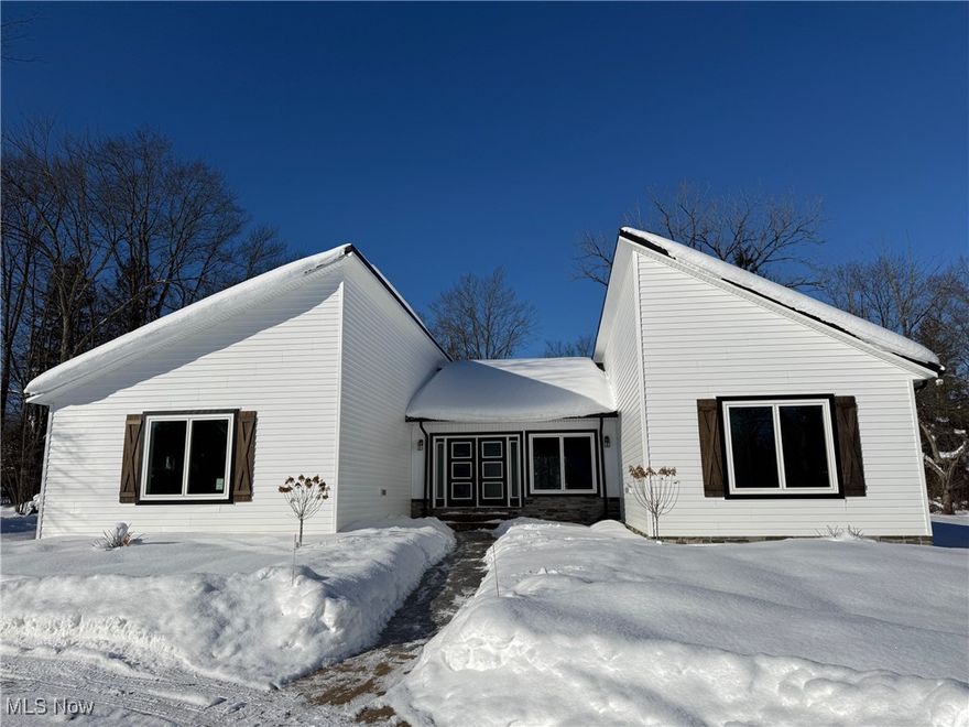 New construction ranch home with over 3000 square feet of finished space, including the finished basement rec room and full bath, set on a beautiful two-thirds acre lot! This single-level design offers four bedrooms and three full bathrooms on the main floor. The open-concept layout seamlessly connects the spacious living room with gas fireplace, dining area, and chef’s kitchen which includes a 48" gas range, smart refrigerator, drawer microwave, dishwasher. Primary suite includes 2 walk-in closets, en-suite bath with 2 separate vanity areas, private commode area, plus a walk-in shower with body jets, Blue Tooth speakers, LED lighting, rainfall shower. An attached two-car garage is included, and there’s room on the property to add an outbuilding (available as an upgrade with the builder). The extra-deep basement will be partially finished, adding a bath, additional living area, and a convenient walk-up to the backyard. Other features include: stamped concrete entry courtyard; private rear patio; tankless hot water system; Great Room with vaulted ceiling and huge fan; tons of storage including 2 walk-in closets in the primary plus a kitchen pantry; walk-up basement, great for storage or finish for additional living space; circular driveway with extra parking pad. NO HOA!