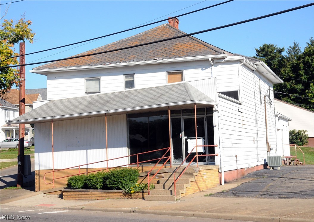 High traffic location and spacious store and warehouse area on 1st floor. Has central air and loading dock area. Rooms on First Floor are: back room 11x31; dock room 15 1/2x16 1/2; middle room 17x17; side rear office 17x33; front store area 36x33. Upstairs previously apartments has 8 rooms, 2 baths, 2 kitchen areas. First floor has 1/2 bath in rear.