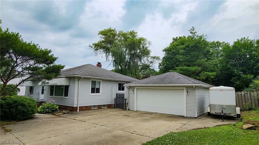 Must see!   Nice ranch with an awesome layout and very large kitchen with peninsula and a ton of cabinets for your storage needs.  Check out the back yard, offering privacy with the wooden fence, shed, and mature trees, complete with a weeping willow!  Plenty of parking with a side pad next to the garage.   Basement is mostly finished, complete with a large rec room.  AS-IS sale. Seller will not make repairs.