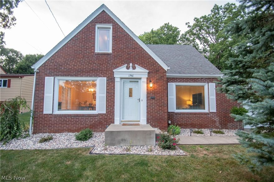 This stunning all brick cape has everything you need to call it home! The open floor plan features vinyl flooring throughout the main level, a formal dining room, living room with a beautiful fireplace, spacious family room and a gorgeous kitchen with updated cabinets and appliances that stay! The upper level boasts a full bathroom with large walk-in shower and newer vanity. The two large bedrooms feature large walk-in closets and beautiful hardwood floors. Partially finished, waterproofed basement with a space that can be used as a bedroom or office. Large all-season room with gas fireplace overlooking the large backyard with shed. attached garage. Tons of updates!  Call to schedule a showing!