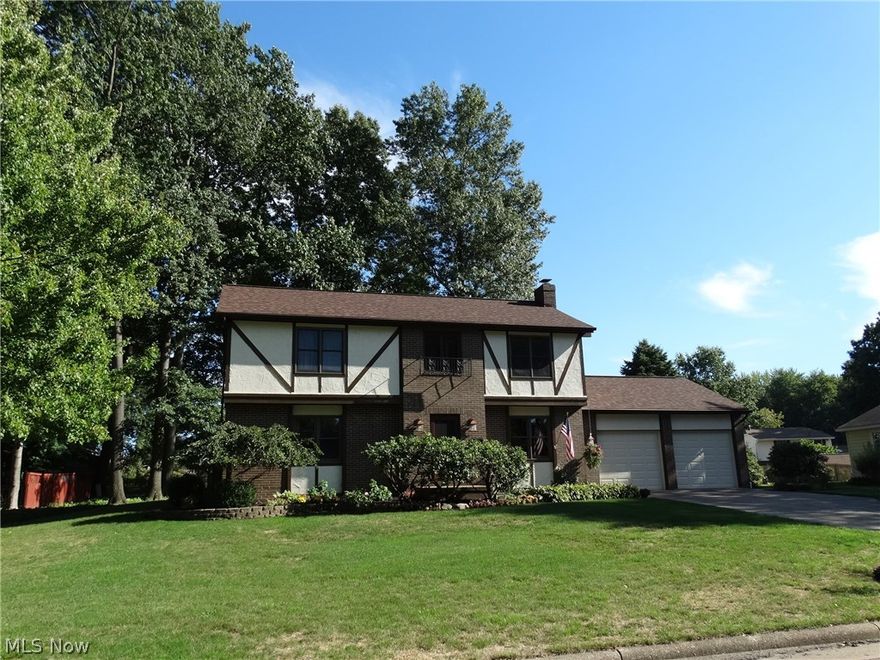 Meticulously cared for throughout the years this two story home will become your families pride and joy for years to come.  In 2000 an impressive family room with cathedral ceiling was added to the home.  Sunshine bright this will be a gathering area your family will enjoy.  From the foyer entry you will experience a welcoming home that opens to living room and dining room with fireplace.  Kitchen with stainless appliances offers breakfast area and island work station.  Office area or den plus large finished rec room (fireplace is decorative only) .  Master bedroom with owners bath and two spacious closets.  The other three bedrooms are generous in size and offer ample closet storage. A gorgeous yard and covered patio area complete this impressive home. Storage shed is 10x12. Many updates throughout the years include furnace, central air (2016), roof, downspouts and gutters (2013), most windows (2009 Anderson),  half bath(2015) main bath(2015 new vanity and commode, kitchen appliance 2