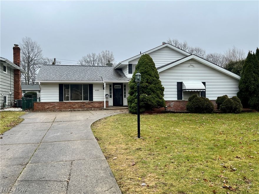 Welcome Home to this 3bd, 1.5 bath charming split level in North Olmsted that has been beautifully updated. New paint, flooring, modern bathrooms.   Kitchen features white cabinets and recessed lighting.  Living room features large picture window allowing for ample natural lighting. Family room with fireplace and sliding doors that opens to large 3 seasons room. Includes newer roof, HVAC, hot water tank.