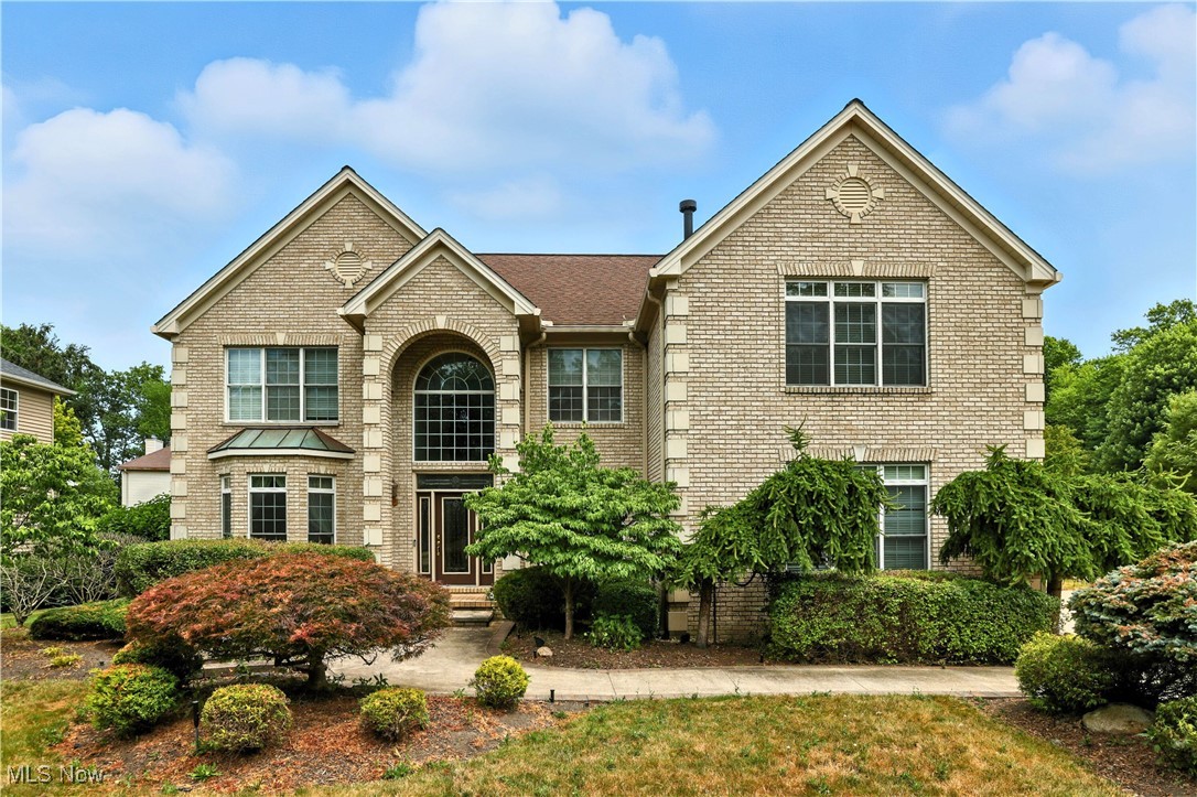 Here’s your chance to own a standout home in one of Westlake’s most desirable neighborhoods—The Glens. This rare all-brick and stone colonial sits on nearly half an acre with lush, park-like landscaping, a peaceful pond and waterfall, and eye-catching outdoor features like custom paver patios, walkways, and an extra-wide driveway with turnaround—all beautifully lit at night. Inside, you’re greeted by a grand two-story foyer finished in marble and granite. The open layout flows into a formal living and dining room with custom tray ceilings, and a private home office with wood built-ins and French doors—perfect for working from home. There’s no shortage of space here—on the main floor you’ll also find a cozy library or den, a bright 4-season sunroom, a full bath, half bath, and a large laundry room. The kitchen is a dream for cooking and gathering, with granite countertops, a breakfast bar, and a spacious eating area. It opens right into the extended great room, which features a wall of windows and a stunning gas fireplace with a custom wood mantel. Upstairs, the primary suite is something special—with its own sitting area, window seat, fireplace, lighted built-ins, and detailed woodwork. The en-suite bath includes a marble shower, jetted tub, dual vanities, and a large walk-in closet. The other bedrooms are nicely sized and connected by a Jack & Jill bathroom. There’s even more space below in the huge basement with 10-foot ceilings, a full bath, office area, and tons of storage—perfect for a future media room, gym, or guest space. This home has been lovingly maintained with high-end finishes throughout, from solid wood doors to custom trim and crown molding. It’s a rare find in a prime location—just a short walk to shopping, dining, and all the fun at Crocker Park.