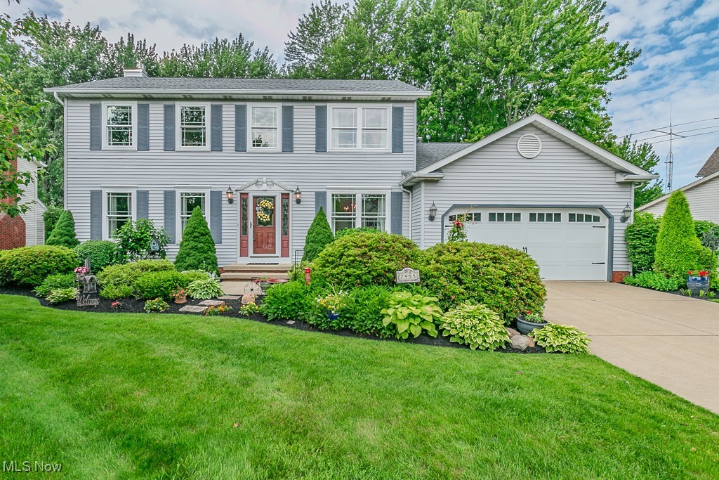 This beautifully updated & meticulously maintained four-bedroom colonial stands out from the rest. Perfectly positioned on a spacious .35-acre lot, this home radiates pride of ownership with thoughtfully designed landscaping & curb appeal. Step inside to a classic center hall layout, flanked by a cozy sitting room & an elegant formal dining room. The heart of the home lies just beyond: an updated kitchen featuring engineered hardwood floors, granite countertops, white cabinetry, glass tile backsplash, & stainless steel appliances—to create a modern yet timeless space. Adjacent to the kitchen, relax in the warm & inviting family room with custom built-in bookshelves & gas fireplace with a brick surround—a perfect retreat for chilly mornings & cozy nights. Unique to this home is a first-floor laundry room, tucked behind the kitchen & powder room for added convenience. Step outside to enjoy the seasons bug-free on the screened & covered composite deck. The brick paver patio & spacious backyard offer room to entertain, play, & unwind, with a storage shed included for all your outdoor essentials. The two-car garage features a bump-out for additional storage, complete with shelving, an opener, & a water spigot. Upstairs, you’ll find four generously sized bedrooms & two full bathrooms, including a primary suite with a walk-in closet & an updated en suite bath with a tiled walk-in shower & glass doors. The unfinished lower level offers flexibility—whether for storage or future living space, it’s a blank canvas ready for your vision. Additional exterior features include a 12-zone irrigation system & gutter guards to keep maintenance easy. Major updates include: Pella windows & doors (2019), composite deck (2014), furnace (2021), built-in bookshelves (2021), kitchen, powder room, & hall bath remodel (2015), primary shower tile (2022). Don’t miss the opportunity to own a one-of-a-kind colonial that combines comfort, functionality, & timeless style. Schedule your showing today!