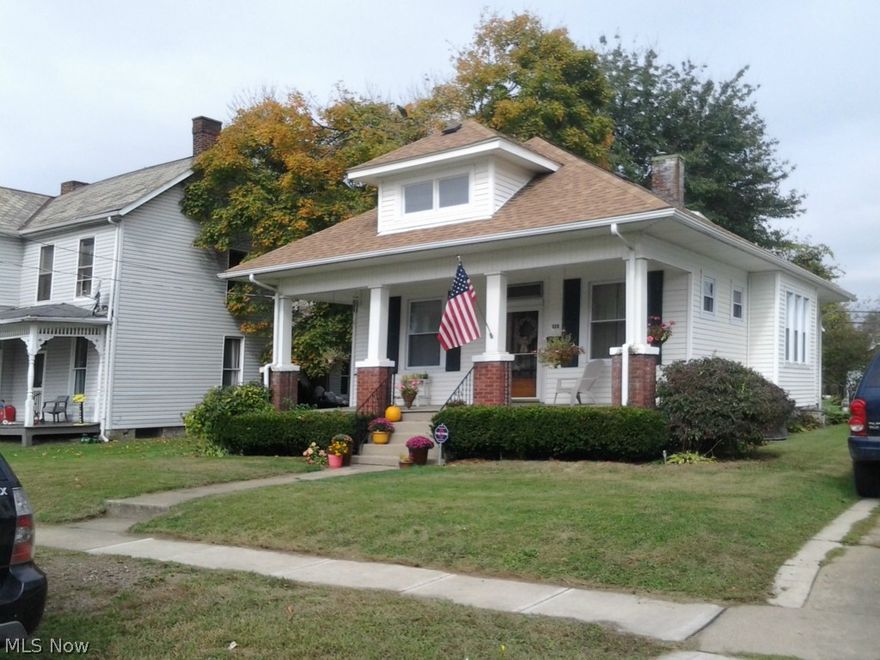 This Beautiful 1930 Home has 1662 Finished Square Feet with the Character of that Era with 10 Feet Ceilings and the Original Woodwork. There is a Built in Dining Room Cupboard that Promotes the Fantastic Oak Hardwood Floors with a Magnificent 38 x 14 Master Bedroom on the Second Level that includes a Water Closet. It also Features Two Additional Bedrooms on the Main Level with a Full Kitchen and Separate Dining Room. This Home has a Large Front Porch and a Rear Covered Sun Porch. The Basement is Very Dry and is Great for Storage...It has a current Cleveland Browns Theme in one Area! There was a New Roof Installed in 2013 and the Property has been Very Well Maintained. It is Move in Ready...Absolutely Beautiful...Come See For Yourself. Now Is The Time To Visit The Past TODAY and Experience the Comfort of this Property!!!